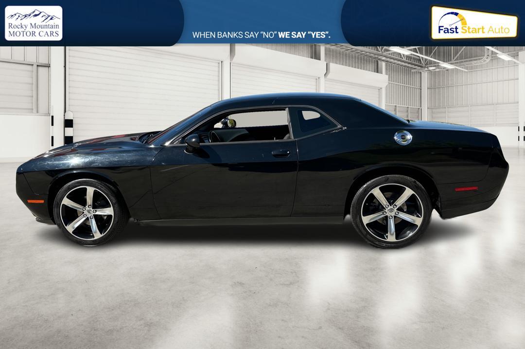 2016 Black Dodge Challenger SXT (2C3CDZAG0GH) with an 3.6L V6 DOHC 24V engine, 5A transmission, located at 767 S State Road, Pleasant Grove, UT, 84062, (801) 785-1058, 40.354839, -111.736687 - Photo #5