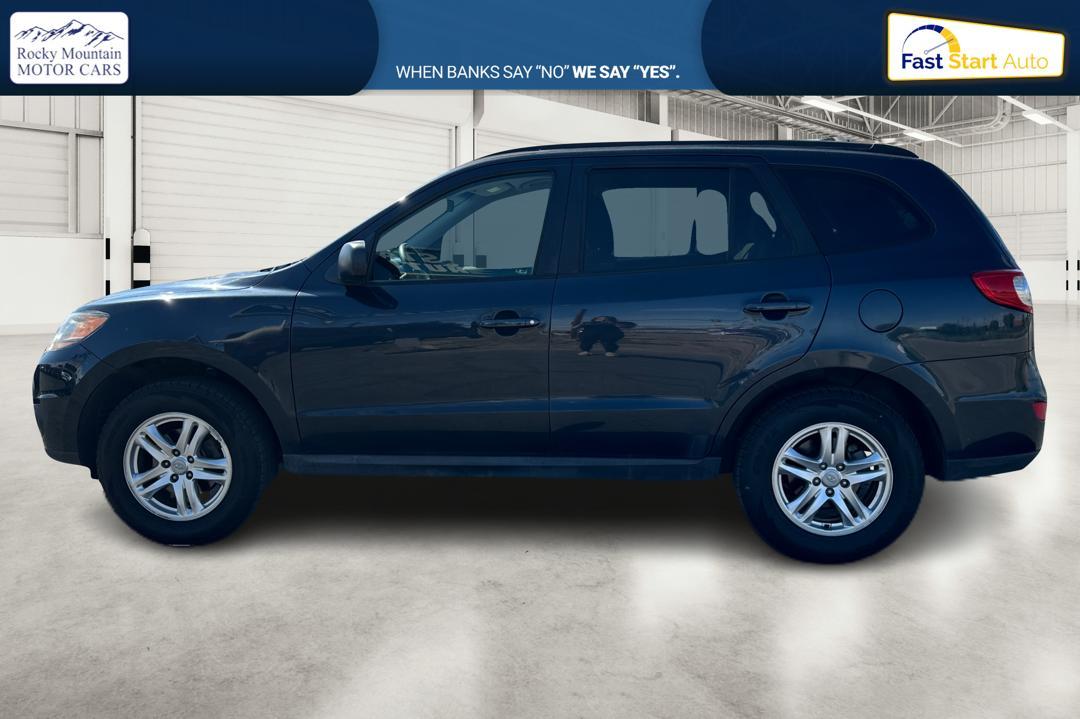 2011 Blue Hyundai Santa Fe GL 2.4 FWD (5XYZG3AB2BG) with an 2.4L L4 DOHC 16V engine, 6-Speed Automatic transmission, located at 7755 State Street, Midvale, UT, 84047, (801) 753-9063, 40.610329, -111.890656 - Photo #5