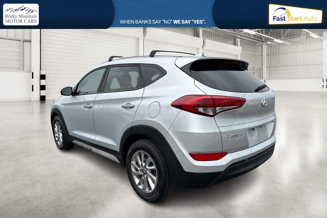 2018 Silver Hyundai Tucson SE (KM8J33A43JU) with an 2.0L L4 DOHC 16V engine, 6A transmission, located at 7755 State Street, Midvale, UT, 84047, (801) 753-9063, 40.610329, -111.890656 - Photo #4