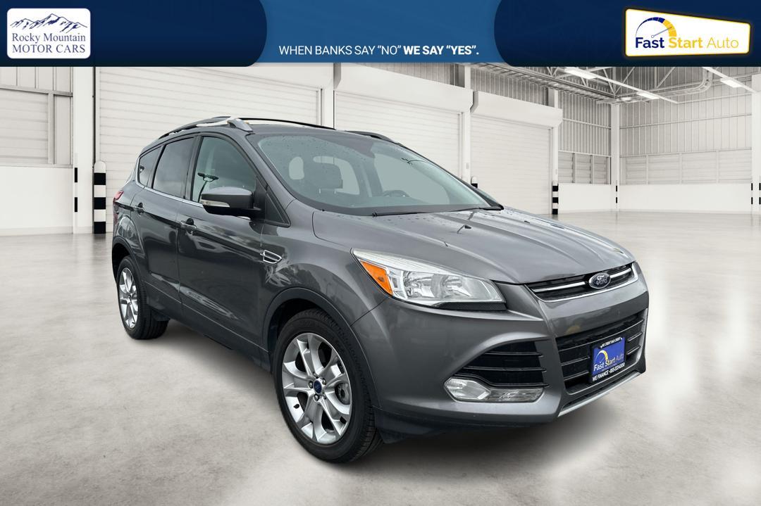 2014 Gray Ford Escape Titanium FWD (1FMCU0J97EU) with an 2.0L L4 DOHC 16V engine, 6-Speed Automatic transmission, located at 7755 State Street, Midvale, UT, 84047, (801) 753-9063, 40.610329, -111.890656 - Photo #0