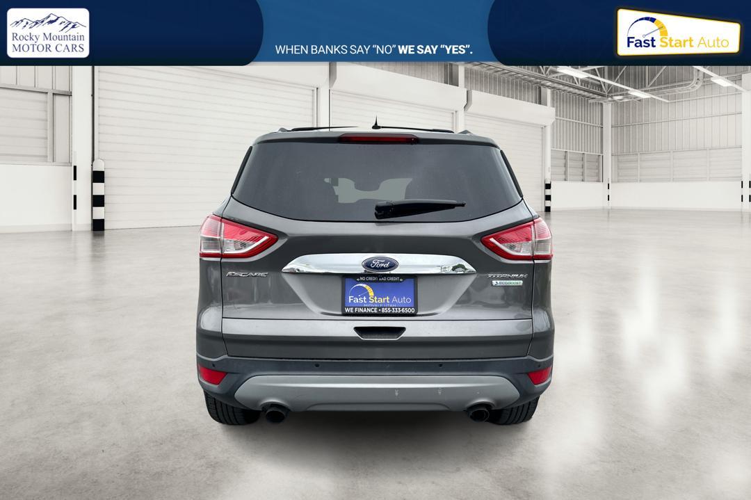 2014 Gray Ford Escape Titanium FWD (1FMCU0J97EU) with an 2.0L L4 DOHC 16V engine, 6-Speed Automatic transmission, located at 7755 State Street, Midvale, UT, 84047, (801) 753-9063, 40.610329, -111.890656 - Photo #3
