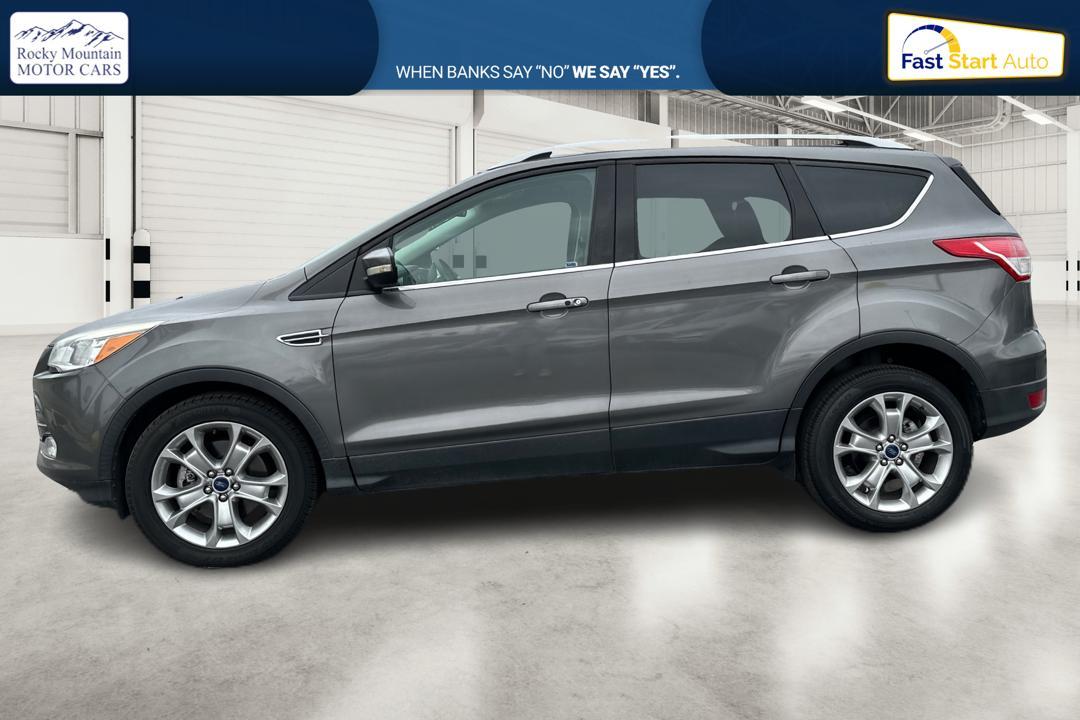 2014 Gray Ford Escape Titanium FWD (1FMCU0J97EU) with an 2.0L L4 DOHC 16V engine, 6-Speed Automatic transmission, located at 7755 State Street, Midvale, UT, 84047, (801) 753-9063, 40.610329, -111.890656 - Photo #5