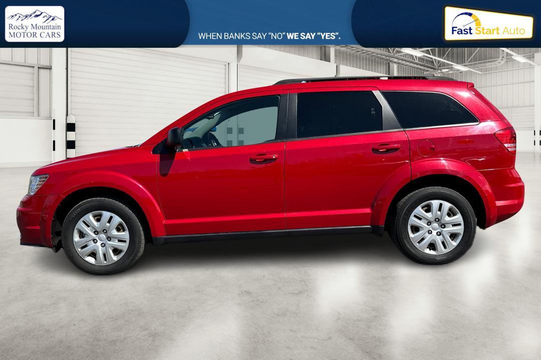 2016 Red Dodge Journey SE (3C4PDCABXGT) with an 2.4L L4 DOHC 16V engine, 4A transmission, located at 7755 State Street, Midvale, UT, 84047, (801) 753-9063, 40.610329, -111.892159 - Photo #5