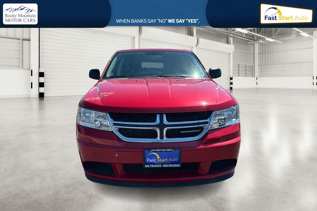 2016 Red Dodge Journey SE (3C4PDCABXGT) with an 2.4L L4 DOHC 16V engine, 4A transmission, located at 7755 State Street, Midvale, UT, 84047, (801) 753-9063, 40.610329, -111.890656 - Photo #7