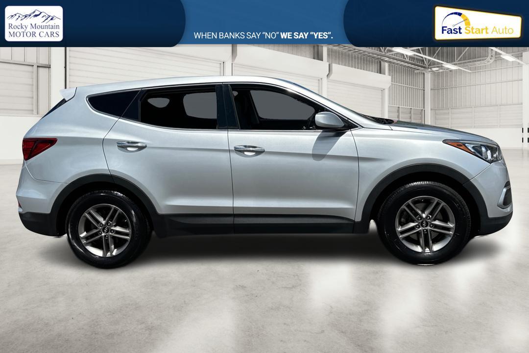2018 Silver Hyundai Santa Fe Sport 2.4 FWD (5XYZT3LB1JG) with an 2.4L L4 DOHC 16V engine, 6A transmission, located at 767 S State Road, Pleasant Grove, UT, 84062, (801) 785-1058, 40.354839, -111.736687 - Photo #1