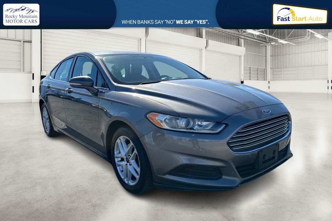 2014 Gray Ford Fusion SE (3FA6P0H74ER) with an 2.5L L4 DOHC 16V engine, Automatic, 6-Spd transmission, located at 767 S State Road, Pleasant Grove, UT, 84062, (801) 785-1058, 40.354839, -111.736687 - Photo #0