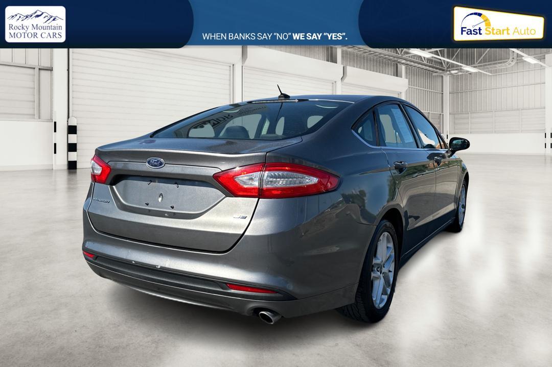 2014 Gray Ford Fusion SE (3FA6P0H74ER) with an 2.5L L4 DOHC 16V engine, Automatic, 6-Spd transmission, located at 767 S State Road, Pleasant Grove, UT, 84062, (801) 785-1058, 40.354839, -111.736687 - Photo #2