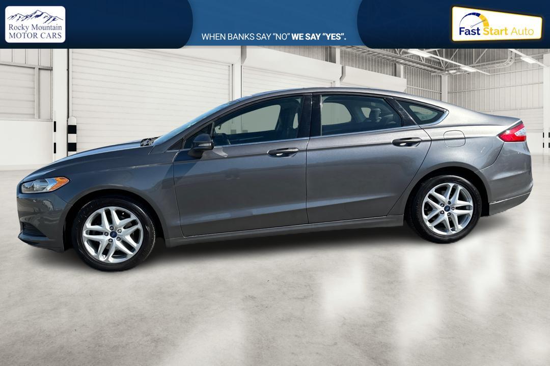 2014 Gray Ford Fusion SE (3FA6P0H74ER) with an 2.5L L4 DOHC 16V engine, Automatic, 6-Spd transmission, located at 767 S State Road, Pleasant Grove, UT, 84062, (801) 785-1058, 40.354839, -111.736687 - Photo #5