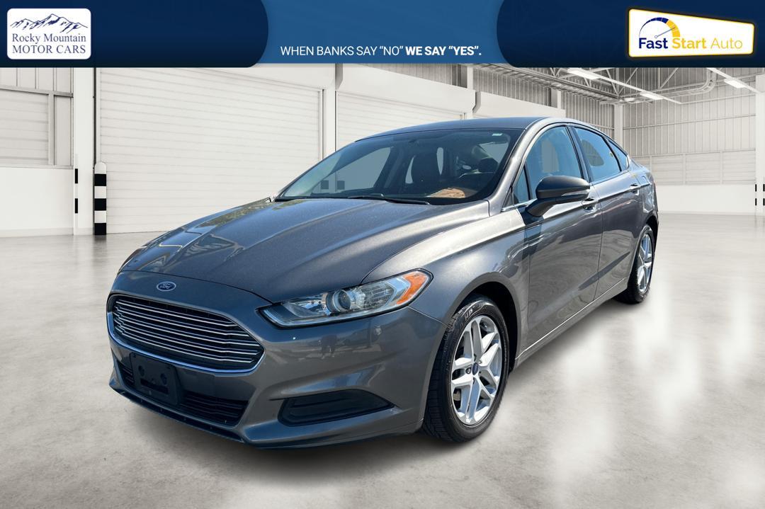2014 Gray Ford Fusion SE (3FA6P0H74ER) with an 2.5L L4 DOHC 16V engine, Automatic, 6-Spd transmission, located at 767 S State Road, Pleasant Grove, UT, 84062, (801) 785-1058, 40.354839, -111.736687 - Photo #6