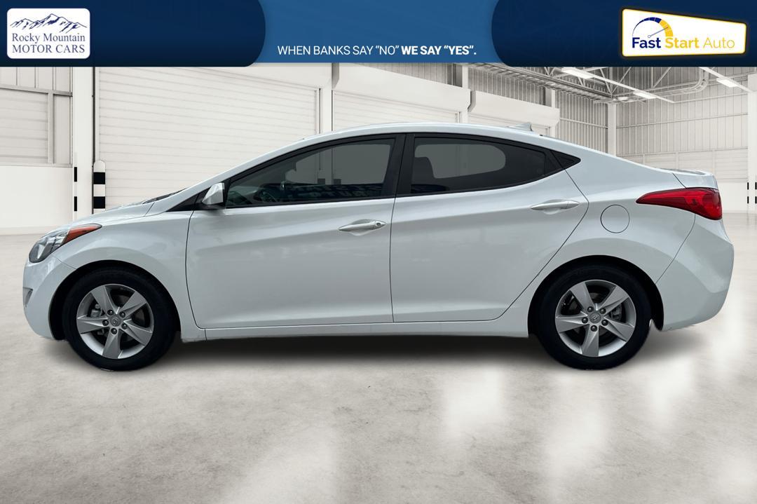 2013 White Hyundai Elantra Limited (5NPDH4AEXDH) with an 1.8L L4 DOHC 16V engine, 6-Speed Automatic transmission, located at 7755 State Street, Midvale, UT, 84047, (801) 753-9063, 40.610329, -111.890656 - Photo #5