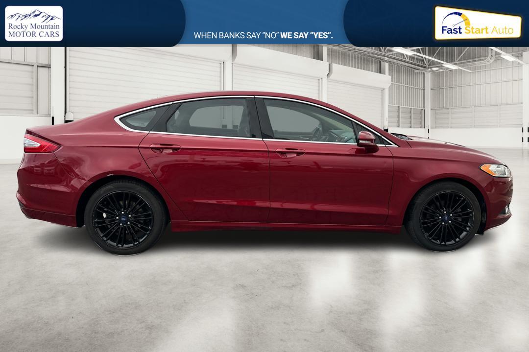 2016 Red Ford Fusion SE (1FA6P0HD4G5) with an 1.5L L4 DOHC 16V engine, 6-Speed Automatic transmission, located at 344 S Washington Blvd, Ogden, UT, 84404, (801) 399-1799, 41.255482, -111.970848 - Photo#1