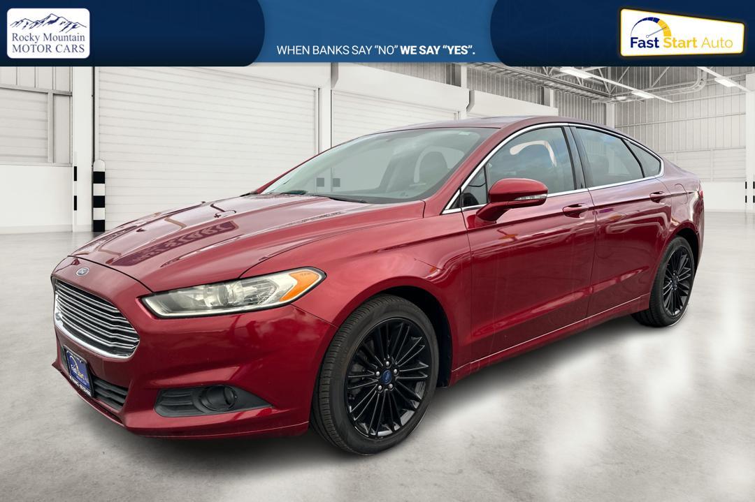 2016 Red Ford Fusion SE (1FA6P0HD4G5) with an 1.5L L4 DOHC 16V engine, 6-Speed Automatic transmission, located at 344 S Washington Blvd, Ogden, UT, 84404, (801) 399-1799, 41.255482, -111.970848 - Photo#8