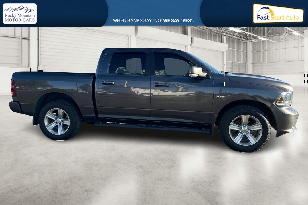 2015 Gray RAM 1500 Sport Crew Cab SWB 4WD (1C6RR7MT1FS) with an 5.7L V8 OHV 16V engine, 6-Speed Automatic transmission, located at 767 S State Road, Pleasant Grove, UT, 84062, (801) 785-1058, 40.354839, -111.736687 - Photo#1