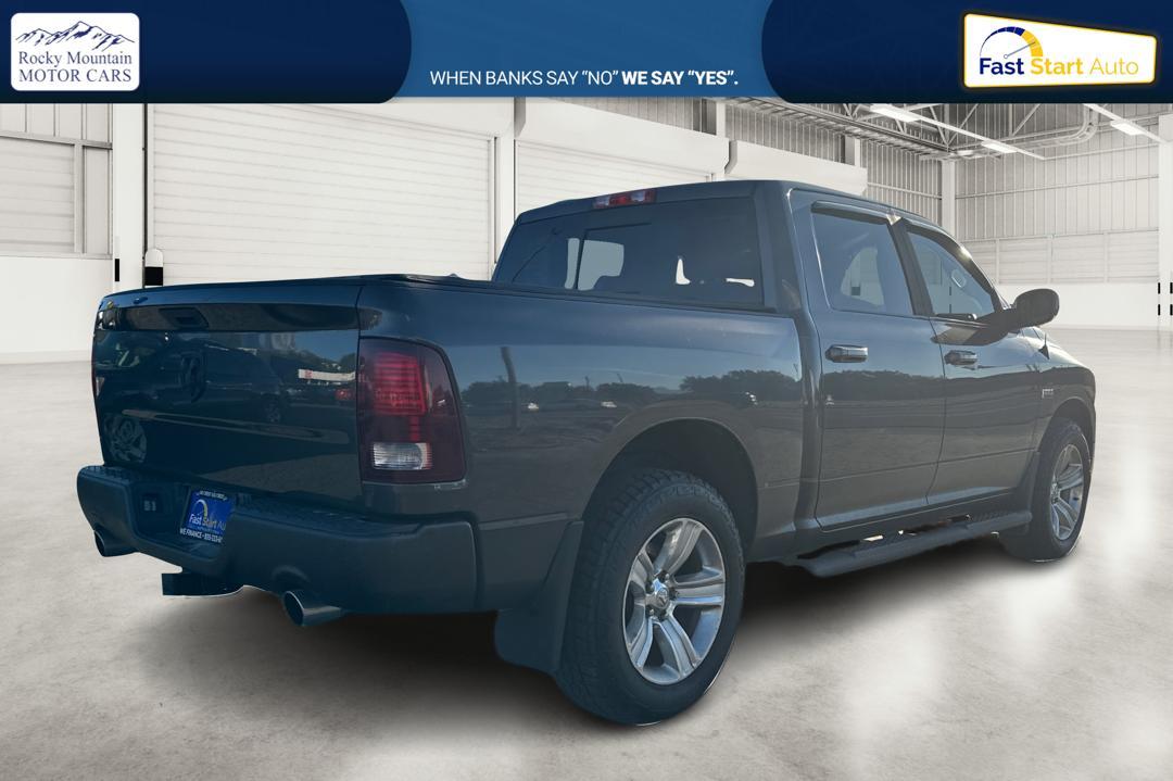 2015 Gray RAM 1500 Sport Crew Cab SWB 4WD (1C6RR7MT1FS) with an 5.7L V8 OHV 16V engine, 6-Speed Automatic transmission, located at 767 S State Road, Pleasant Grove, UT, 84062, (801) 785-1058, 40.354839, -111.736687 - Photo#2