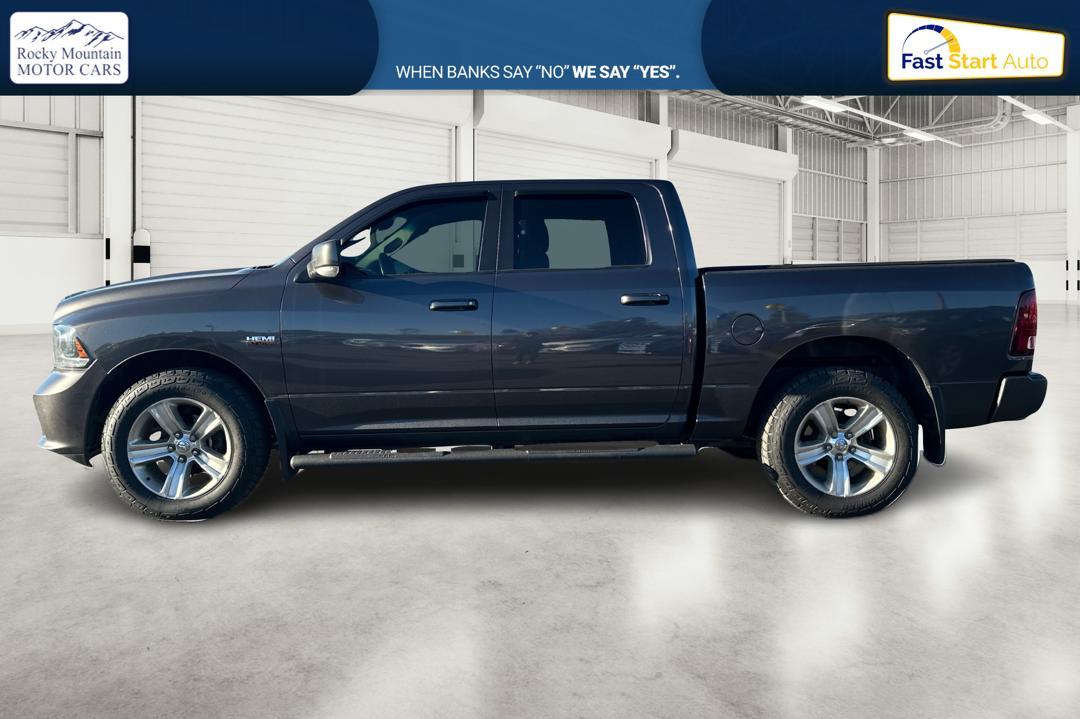 2015 Gray RAM 1500 Sport Crew Cab SWB 4WD (1C6RR7MT1FS) with an 5.7L V8 OHV 16V engine, 6-Speed Automatic transmission, located at 767 S State Road, Pleasant Grove, UT, 84062, (801) 785-1058, 40.354839, -111.736687 - Photo#6