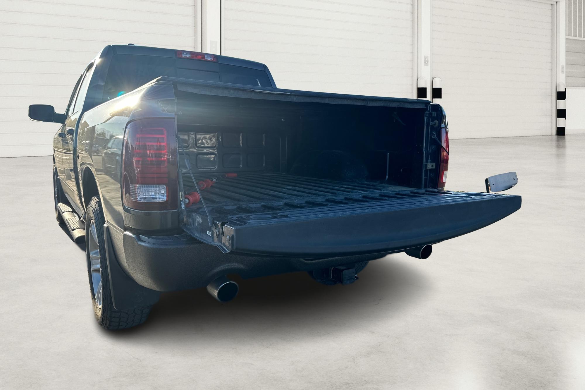 2015 Gray RAM 1500 Sport Crew Cab SWB 4WD (1C6RR7MT1FS) with an 5.7L V8 OHV 16V engine, 6-Speed Automatic transmission, located at 767 S State Road, Pleasant Grove, UT, 84062, (801) 785-1058, 40.354839, -111.736687 - Photo#13