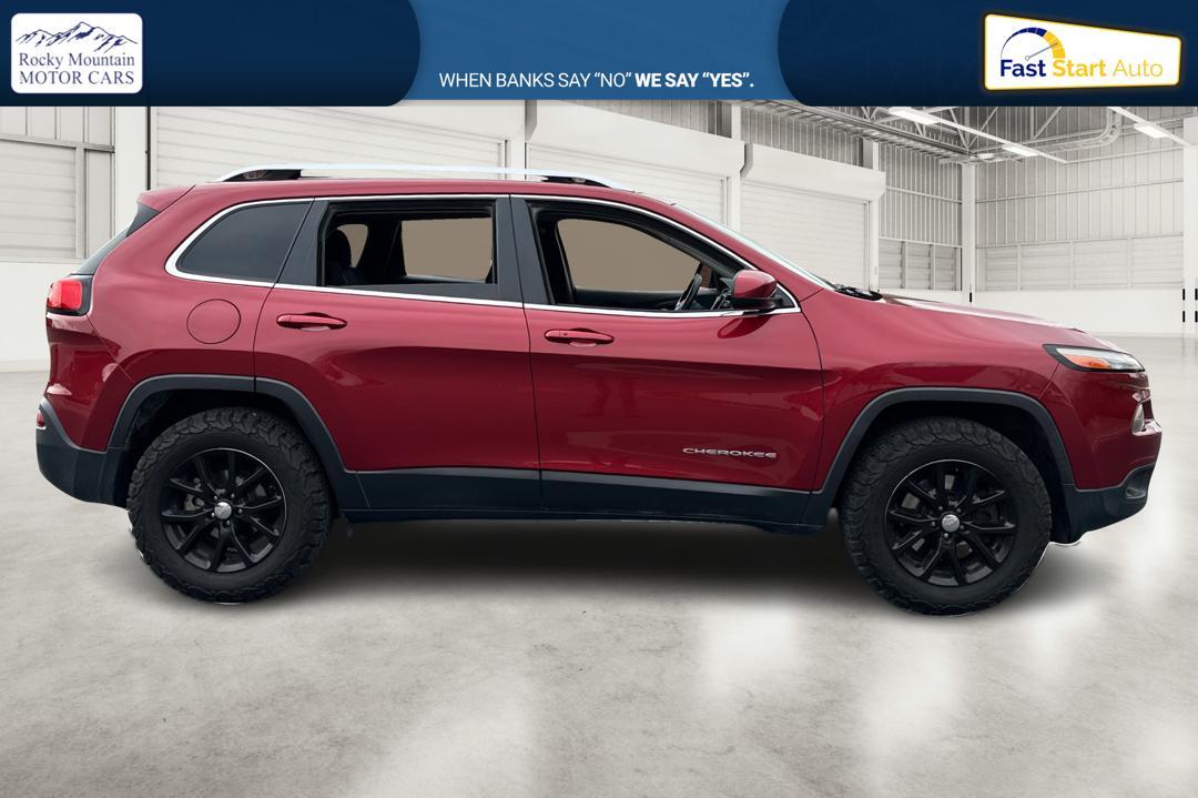 2016 Red Jeep Cherokee Latitude FWD (1C4PJLCB1GW) with an 2.4L L4 DOHC 16V engine, 9A transmission, located at 767 S State Road, Pleasant Grove, UT, 84062, (801) 785-1058, 40.354839, -111.736687 - Photo#1