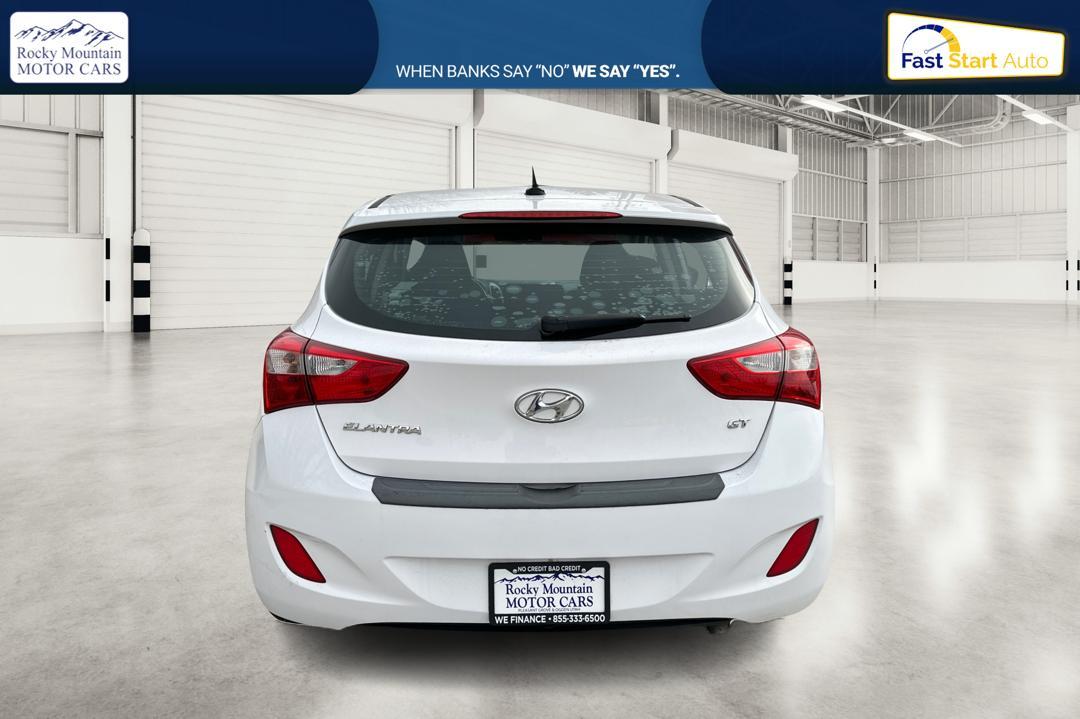 2016 White Hyundai Elantra GT A/T (KMHD35LH2GU) with an 2.0L L4 16V DOHC engine, 6A transmission, located at 344 S Washington Blvd, Ogden, UT, 84404, (801) 399-1799, 41.255482, -111.970848 - Photo#4