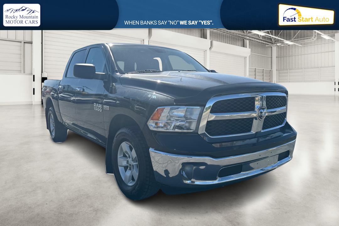 2018 Black RAM 1500 SLT Crew Cab SWB 4WD (1C6RR7LT4JS) with an 5.7L V8 OHV 16V engine, 8A transmission, located at 7755 State Street, Midvale, UT, 84047, (801) 753-9063, 40.610329, -111.892159 - Photo#0