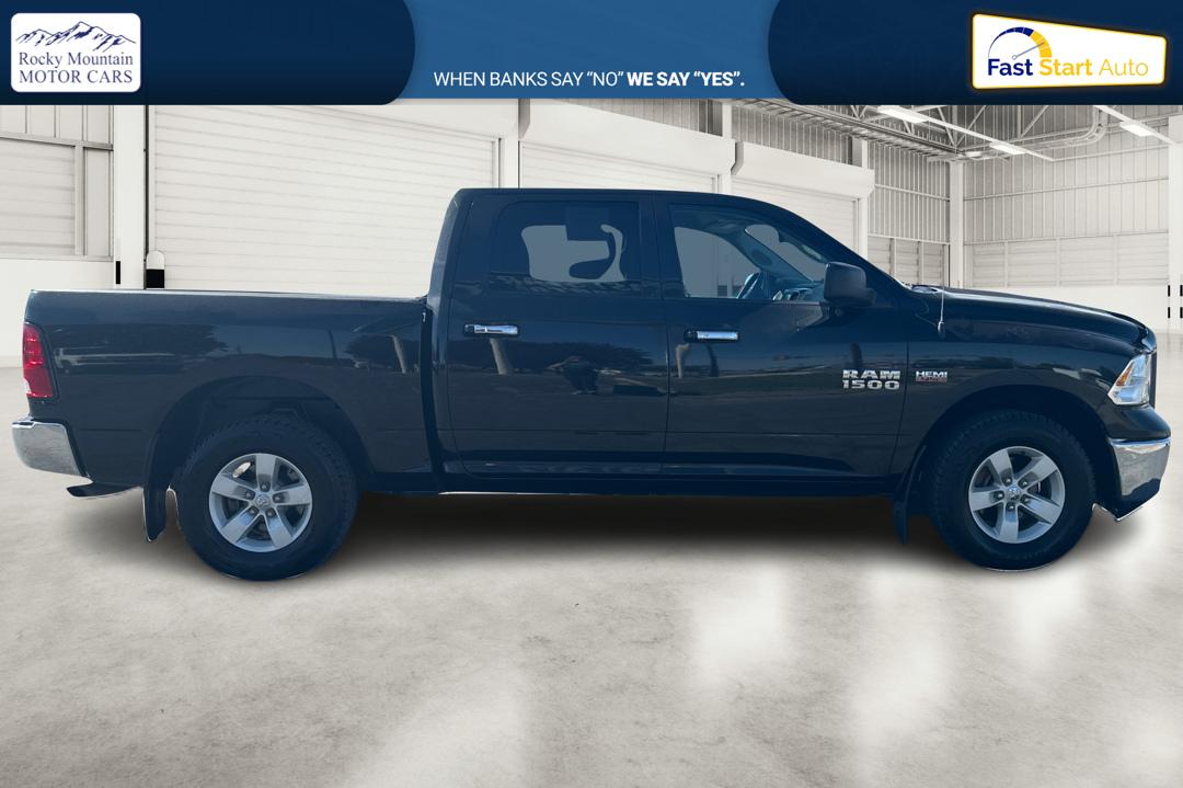 2018 Black RAM 1500 SLT Crew Cab SWB 4WD (1C6RR7LT4JS) with an 5.7L V8 OHV 16V engine, 8A transmission, located at 7755 State Street, Midvale, UT, 84047, (801) 753-9063, 40.610329, -111.892159 - Photo#1