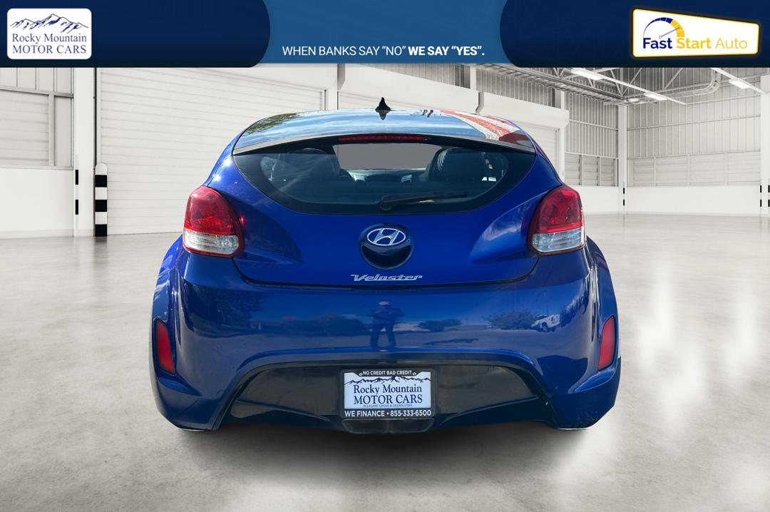 2013 Blue Hyundai Veloster Base (KMHTC6AD7DU) with an 1.6L L4 DOHC 16V engine, Auto, 6-Spd EcoShft DCT transmission, located at 767 S State Road, Pleasant Grove, UT, 84062, (801) 785-1058, 40.354839, -111.736687 - Photo#4