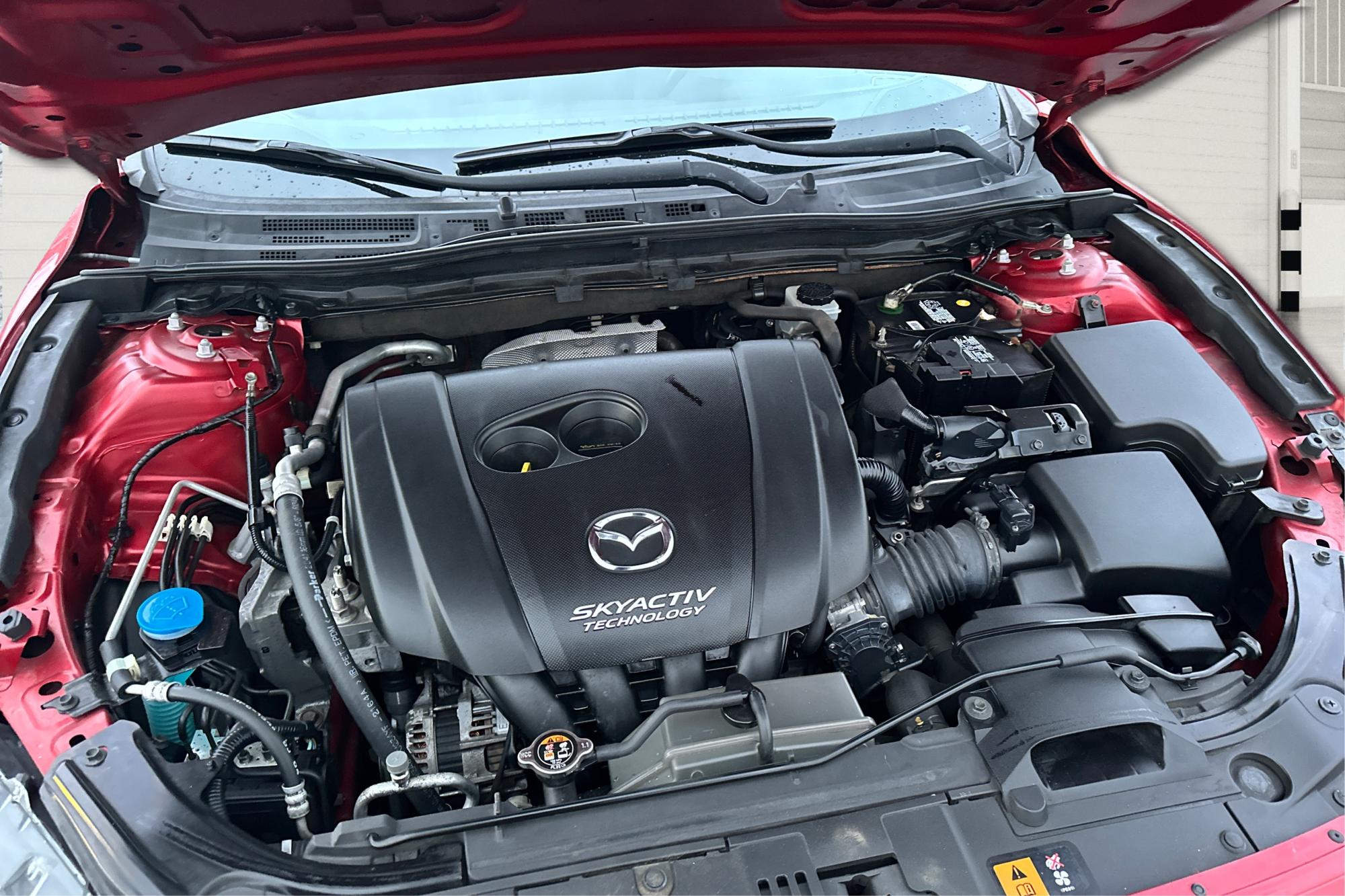 2015 Red Mazda MAZDA3 i Grand Touring AT 5-Door (JM1BM1M75F1) with an 2.0L L4 DOHC 16V engine, 6-Speed Automatic transmission, located at 7755 State Street, Midvale, UT, 84047, (801) 753-9063, 40.610329, -111.892159 - Photo#10