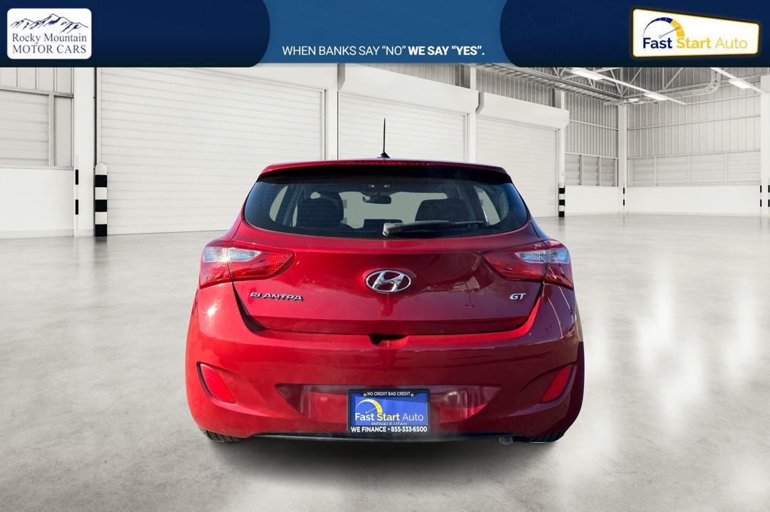 2016 Red Hyundai Elantra GT A/T (KMHD35LH0GU) with an 2.0L L4 16V DOHC engine, 6A transmission, located at 7755 State Street, Midvale, UT, 84047, (801) 753-9063, 40.610329, -111.892159 - Photo#4