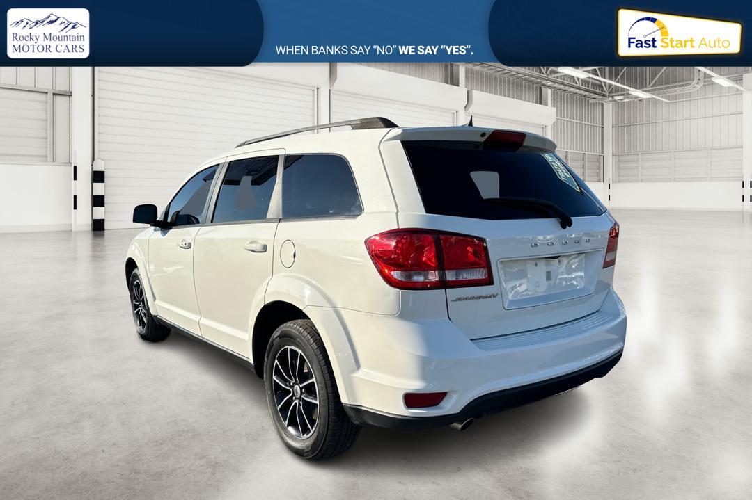 2018 White Dodge Journey SXT (3C4PDCBG9JT) with an 3.6L V6 DOHC 24V engine, 4A transmission, located at 7755 State Street, Midvale, UT, 84047, (801) 753-9063, 40.610329, -111.892159 - Photo#5