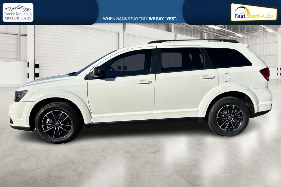 2018 White Dodge Journey SXT (3C4PDCBG9JT) with an 3.6L V6 DOHC 24V engine, 4A transmission, located at 7755 State Street, Midvale, UT, 84047, (801) 753-9063, 40.610329, -111.892159 - Photo#6