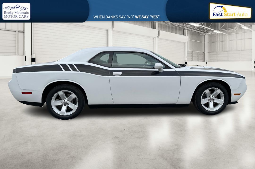 2012 White Dodge Challenger SXT (2C3CDYAG7CH) with an 3.6L V6 DOHC 24V engine, 4-Speed Automatic transmission, located at 7755 State Street, Midvale, UT, 84047, (801) 753-9063, 40.610329, -111.890656 - Photo#1