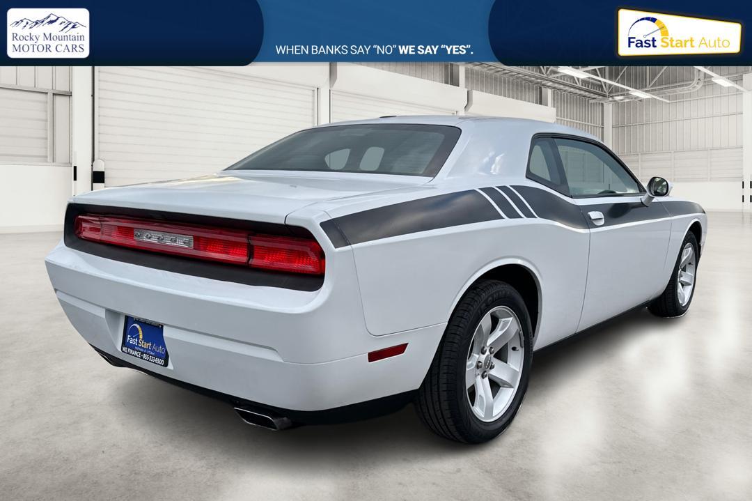 2012 White Dodge Challenger SXT (2C3CDYAG7CH) with an 3.6L V6 DOHC 24V engine, 4-Speed Automatic transmission, located at 7755 State Street, Midvale, UT, 84047, (801) 753-9063, 40.610329, -111.890656 - Photo#2