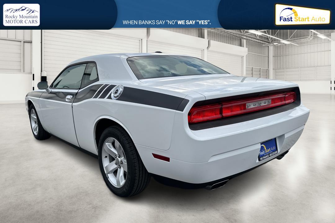 2012 White Dodge Challenger SXT (2C3CDYAG7CH) with an 3.6L V6 DOHC 24V engine, 4-Speed Automatic transmission, located at 7755 State Street, Midvale, UT, 84047, (801) 753-9063, 40.610329, -111.890656 - Photo#5