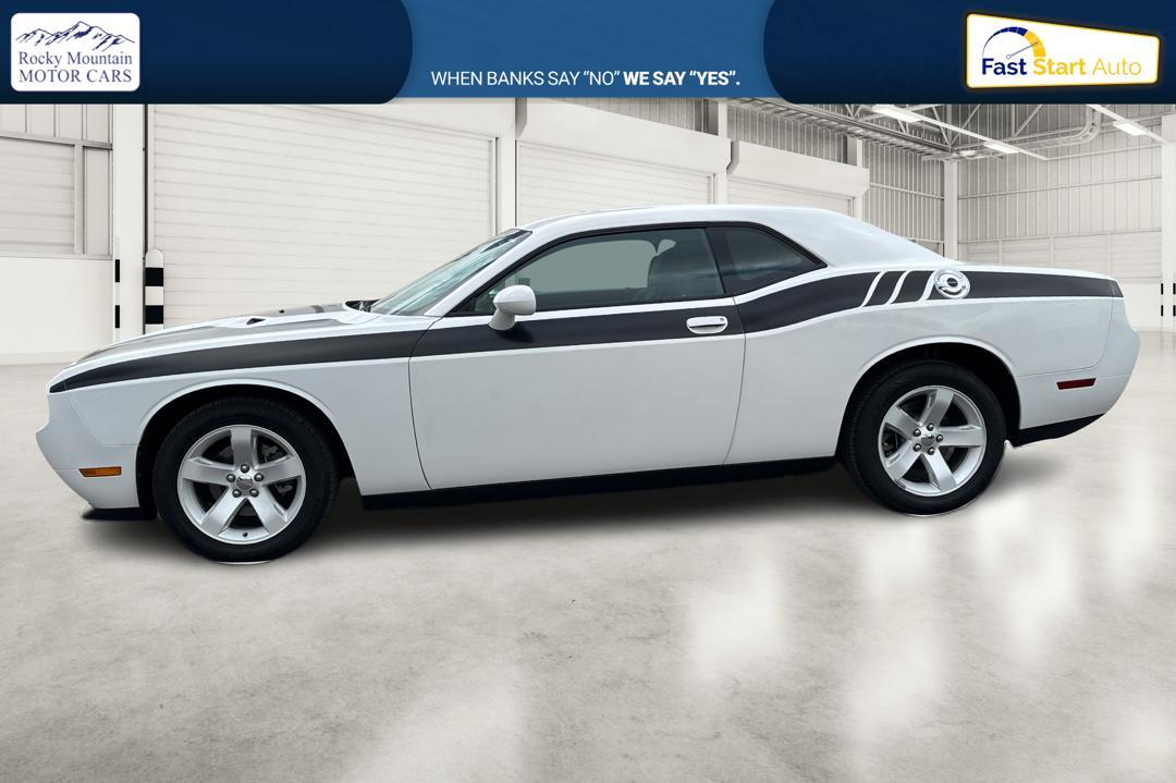 2012 White Dodge Challenger SXT (2C3CDYAG7CH) with an 3.6L V6 DOHC 24V engine, 4-Speed Automatic transmission, located at 7755 State Street, Midvale, UT, 84047, (801) 753-9063, 40.610329, -111.890656 - Photo#6