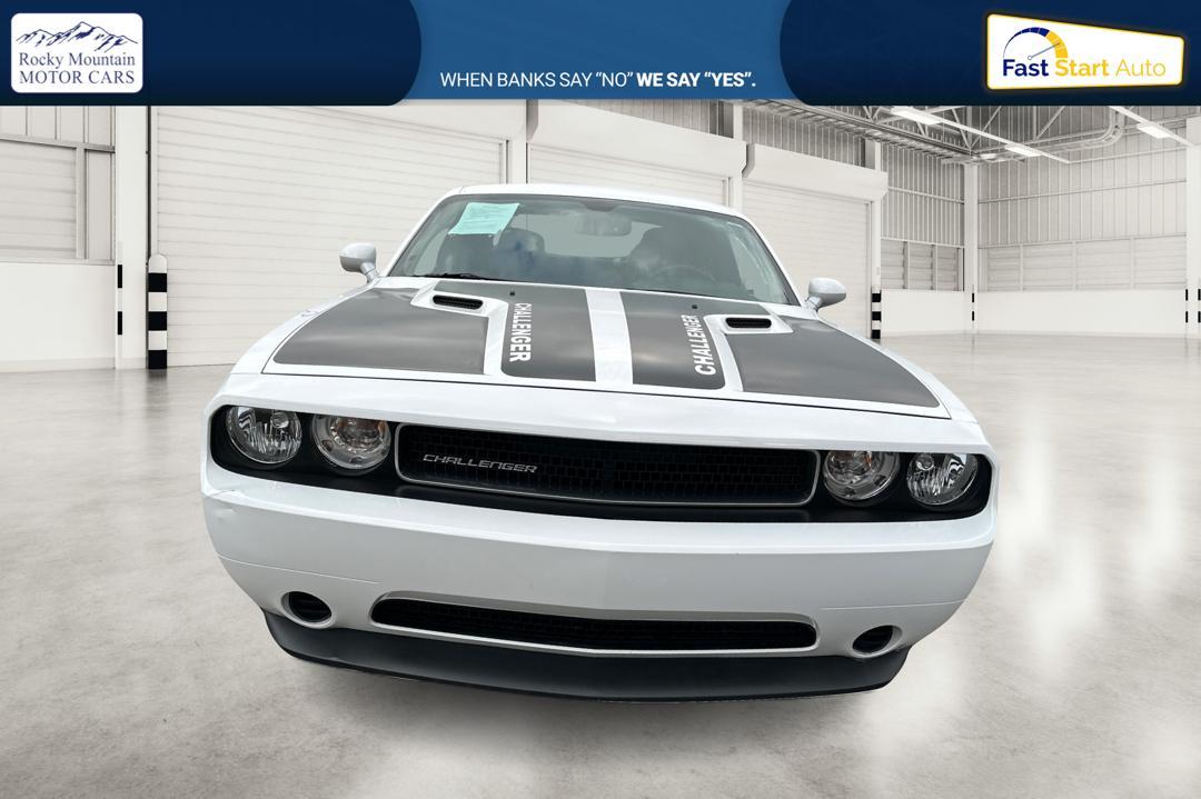 2012 White Dodge Challenger SXT (2C3CDYAG7CH) with an 3.6L V6 DOHC 24V engine, 4-Speed Automatic transmission, located at 7755 State Street, Midvale, UT, 84047, (801) 753-9063, 40.610329, -111.890656 - Photo#9