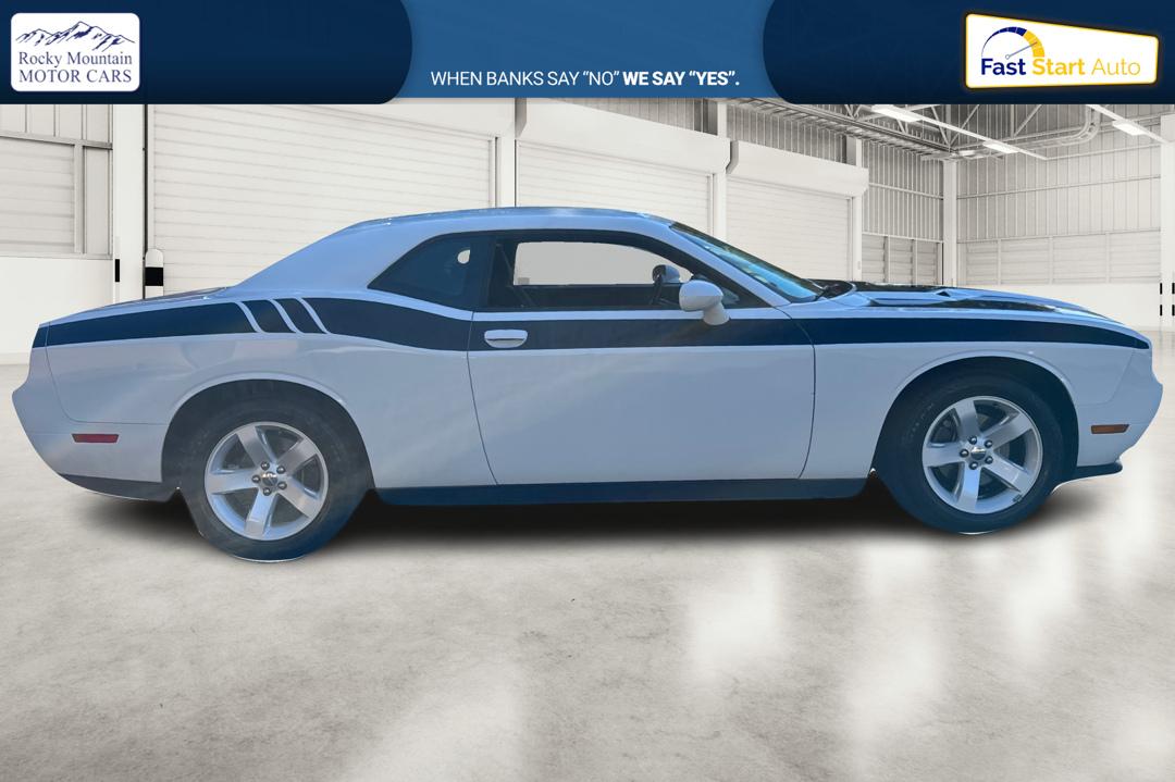 2012 White Dodge Challenger SXT (2C3CDYAG7CH) with an 3.6L V6 DOHC 24V engine, 4-Speed Automatic transmission, located at 767 S State Road, Pleasant Grove, UT, 84062, (801) 785-1058, 40.354839, -111.736687 - Photo#1