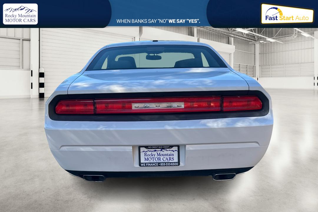 2012 White Dodge Challenger SXT (2C3CDYAG7CH) with an 3.6L V6 DOHC 24V engine, 4-Speed Automatic transmission, located at 767 S State Road, Pleasant Grove, UT, 84062, (801) 785-1058, 40.354839, -111.736687 - Photo#4