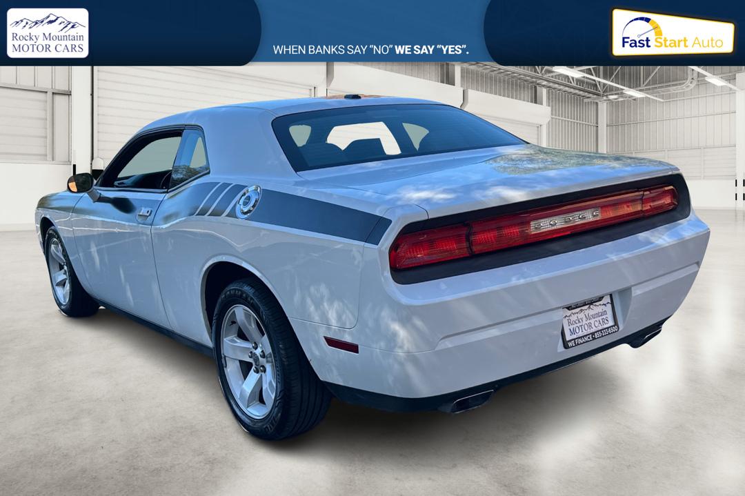 2012 White Dodge Challenger SXT (2C3CDYAG7CH) with an 3.6L V6 DOHC 24V engine, 4-Speed Automatic transmission, located at 767 S State Road, Pleasant Grove, UT, 84062, (801) 785-1058, 40.354839, -111.736687 - Photo#5