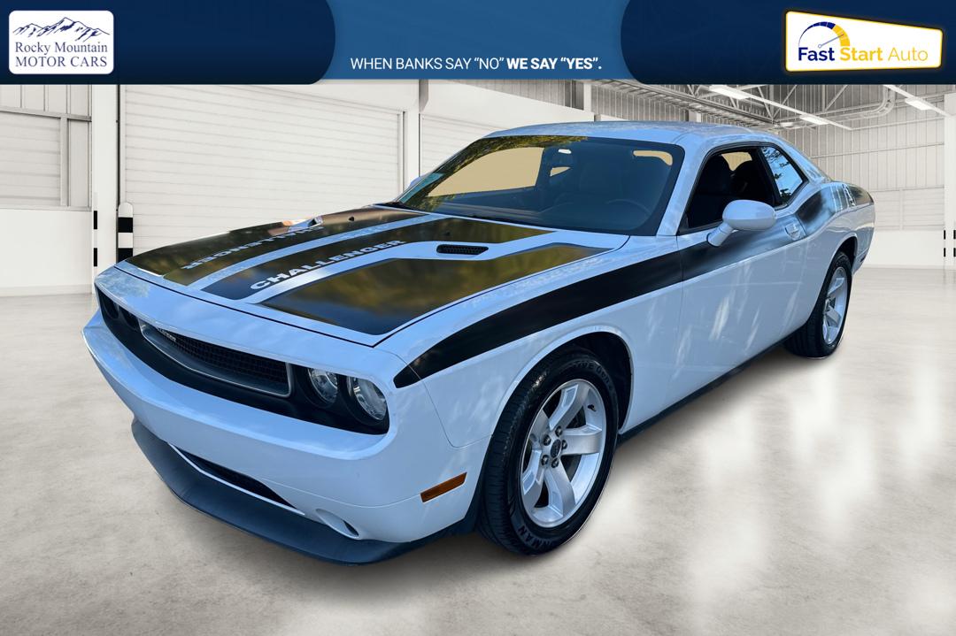 2012 White Dodge Challenger SXT (2C3CDYAG7CH) with an 3.6L V6 DOHC 24V engine, 4-Speed Automatic transmission, located at 767 S State Road, Pleasant Grove, UT, 84062, (801) 785-1058, 40.354839, -111.736687 - Photo#8