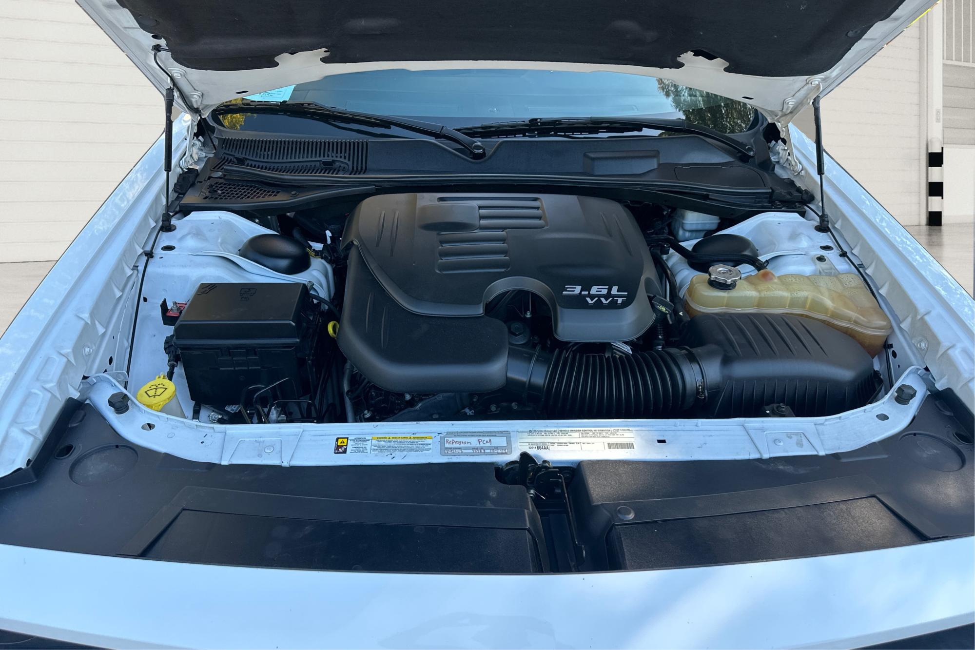 2012 White Dodge Challenger SXT (2C3CDYAG7CH) with an 3.6L V6 DOHC 24V engine, 4-Speed Automatic transmission, located at 767 S State Road, Pleasant Grove, UT, 84062, (801) 785-1058, 40.354839, -111.736687 - Photo#10