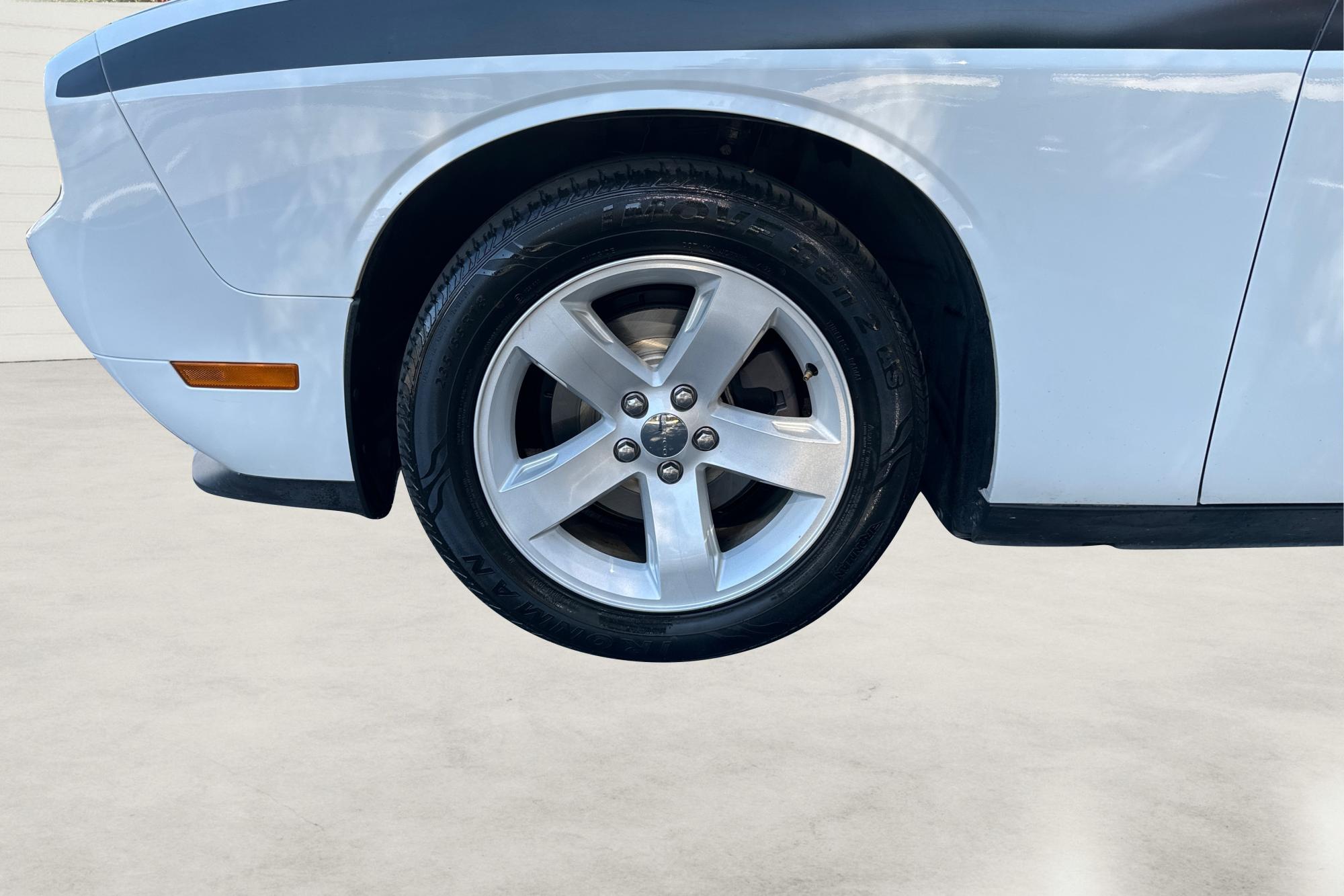 2012 White Dodge Challenger SXT (2C3CDYAG7CH) with an 3.6L V6 DOHC 24V engine, 4-Speed Automatic transmission, located at 767 S State Road, Pleasant Grove, UT, 84062, (801) 785-1058, 40.354839, -111.736687 - Photo#12