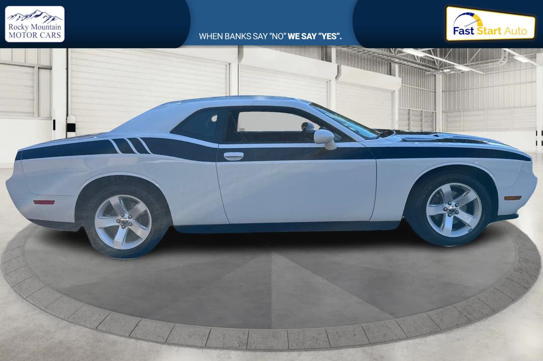 2012 White Dodge Challenger SXT (2C3CDYAG7CH) with an 3.6L V6 DOHC 24V engine, 4-Speed Automatic transmission, located at 767 S State Road, Pleasant Grove, UT, 84062, (801) 785-1058, 40.354839, -111.736687 - Photo#1