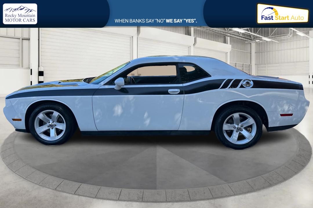 2012 White Dodge Challenger SXT (2C3CDYAG7CH) with an 3.6L V6 DOHC 24V engine, 4-Speed Automatic transmission, located at 767 S State Road, Pleasant Grove, UT, 84062, (801) 785-1058, 40.354839, -111.736687 - Photo#5
