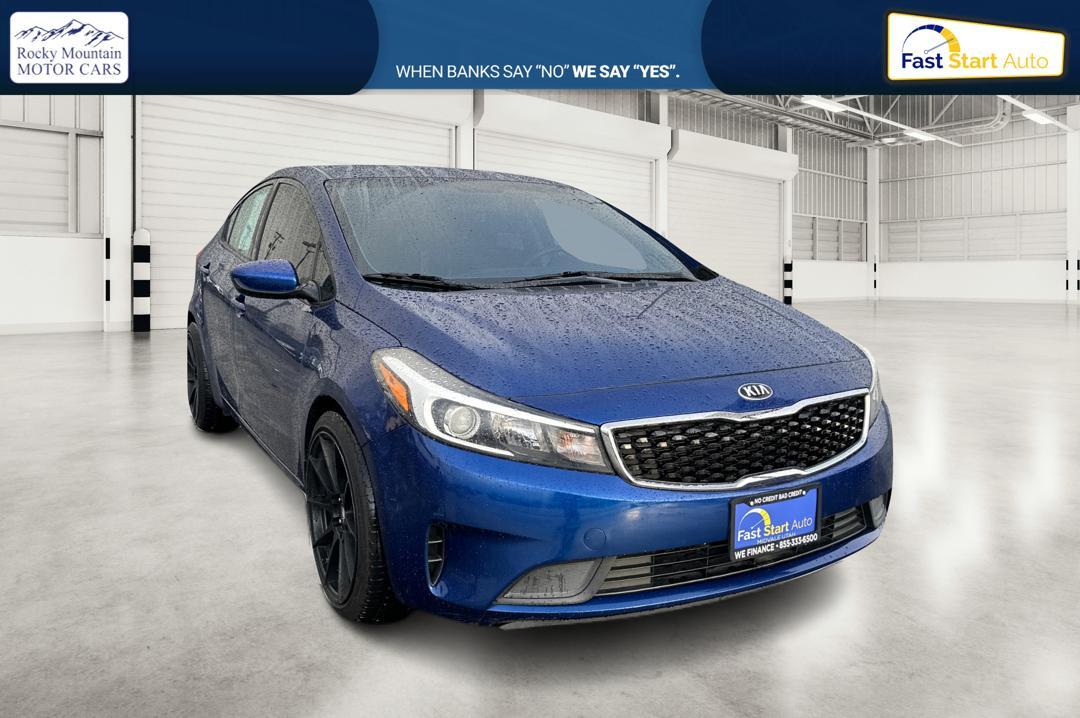 2018 Blue Kia Forte LX 6M (3KPFK4A77JE) with an 2.0L L4 DOHC 16V engine, 6M transmission, located at 7755 State Street, Midvale, UT, 84047, (801) 753-9063, 40.610329, -111.892159 - Photo#0