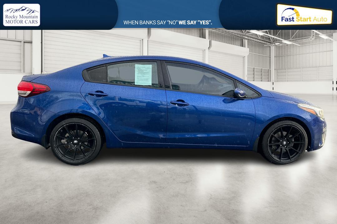 2018 Blue Kia Forte LX 6M (3KPFK4A77JE) with an 2.0L L4 DOHC 16V engine, 6M transmission, located at 7755 State Street, Midvale, UT, 84047, (801) 753-9063, 40.610329, -111.892159 - Photo#1