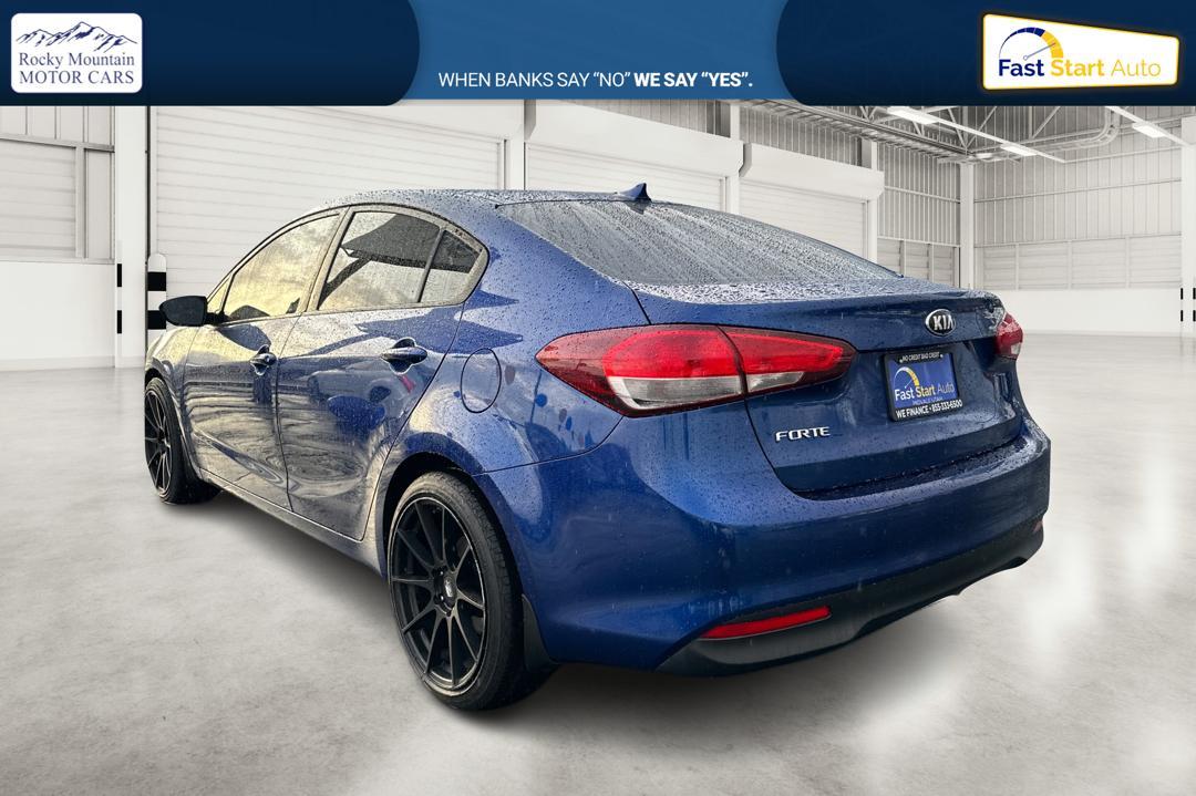 2018 Blue Kia Forte LX 6M (3KPFK4A77JE) with an 2.0L L4 DOHC 16V engine, 6M transmission, located at 7755 State Street, Midvale, UT, 84047, (801) 753-9063, 40.610329, -111.892159 - Photo#5