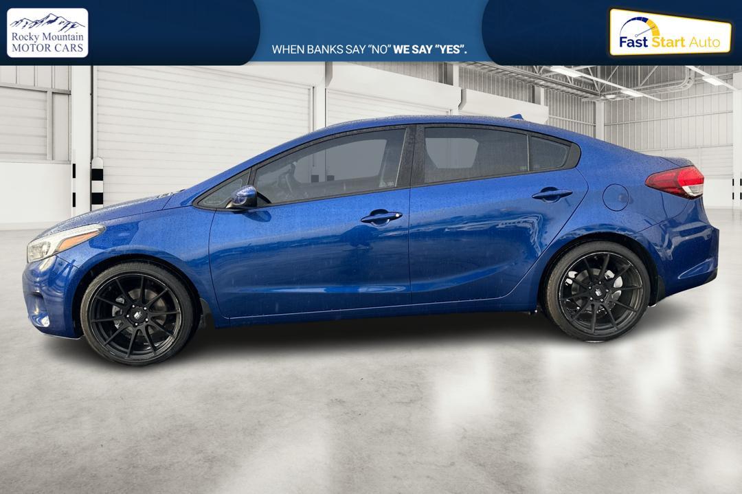 2018 Blue Kia Forte LX 6M (3KPFK4A77JE) with an 2.0L L4 DOHC 16V engine, 6M transmission, located at 7755 State Street, Midvale, UT, 84047, (801) 753-9063, 40.610329, -111.892159 - Photo#6