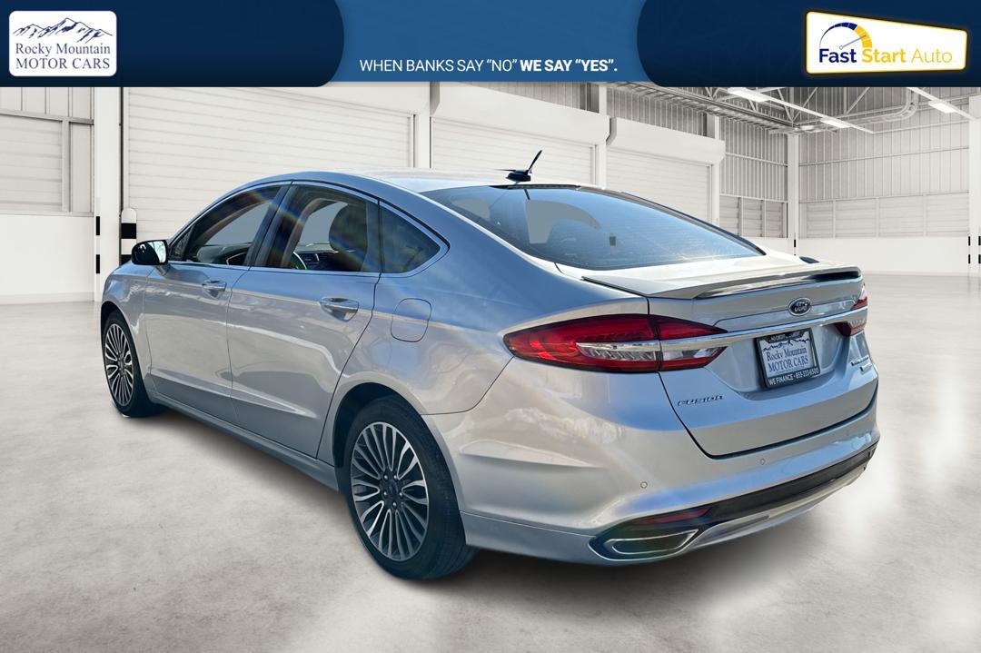 2017 Silver Ford Fusion Titanium (3FA6P0K93HR) with an 2.0L L4 DOHC 16V engine, 6A transmission, located at 767 S State Road, Pleasant Grove, UT, 84062, (801) 785-1058, 40.354839, -111.736687 - Photo#5