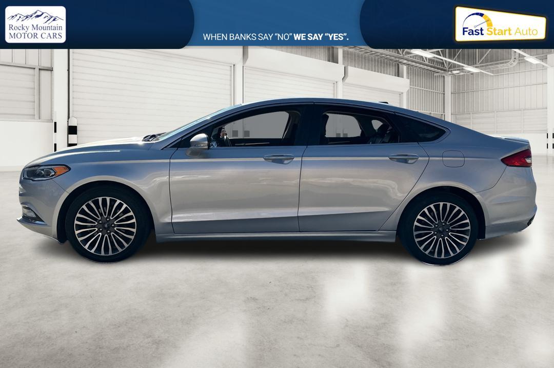 2017 Silver Ford Fusion Titanium (3FA6P0K93HR) with an 2.0L L4 DOHC 16V engine, 6A transmission, located at 767 S State Road, Pleasant Grove, UT, 84062, (801) 785-1058, 40.354839, -111.736687 - Photo#6