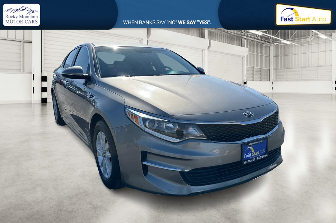 2018 Gray Kia Optima LX (5XXGT4L3XJG) with an 2.4L L4 DOHC 16V engine, 6A transmission, located at 7755 State Street, Midvale, UT, 84047, (801) 753-9063, 40.610329, -111.892159 - Photo#0