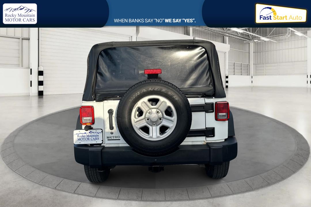 2012 White Jeep Wrangler Sport 4WD (1C4AJWAG0CL) with an 3.6L V6 DOHC 24V FFV engine, Automatic, 5-Spd transmission, located at 767 S State Road, Pleasant Grove, UT, 84062, (801) 785-1058, 40.354839, -111.736687 - Photo#3